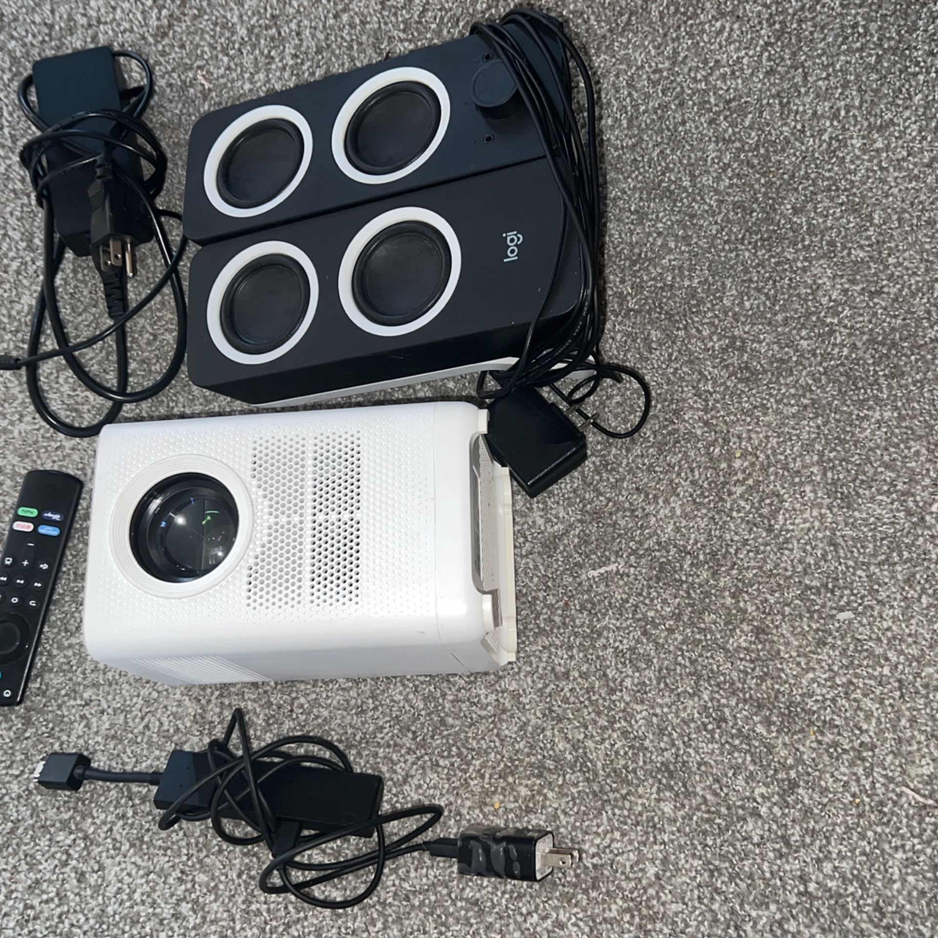 Amazon Projector, Fire Stick And Logitech Speakers 