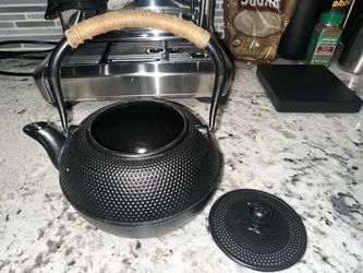 Black Cast iron tea pot with warmer