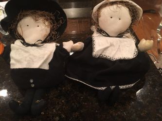 Thanksgiving pilgrims female and male , bought at upscale gift show, beautiful to display out on Thanksgiving. Both for $20-