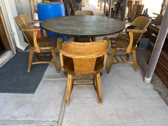 Solid wood table and chairs. Four solid oak chairs