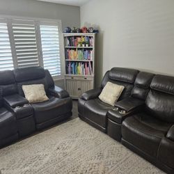 2 Leather Power Reclining Couches