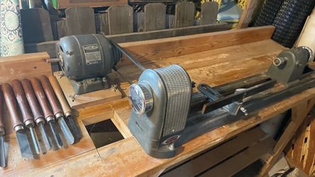 Vintage Wood Lathe on workstation table with shelf