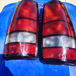 two tail lights 60 bucks are best offer