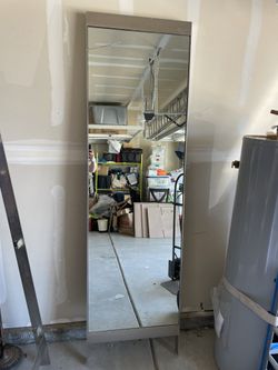 large heavy commercial mirror from Closed Nordstroms. slight crack on top left 2 ft x 7ft 