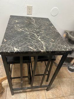 Small table with 2 stools