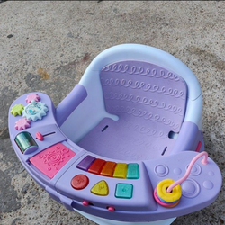 LikeInfantino Music & Lights 3-in-1 Discovery Seat & Booster, Toddler Booster Seat for Dining or Kitchen Chair, Baby Center & Snack Tray, $30