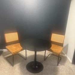 Two chairs and a tape