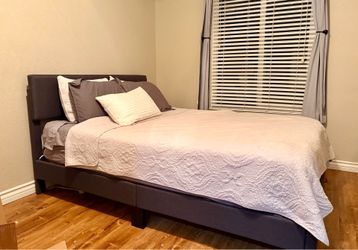 Grey queen upholstered bed frame