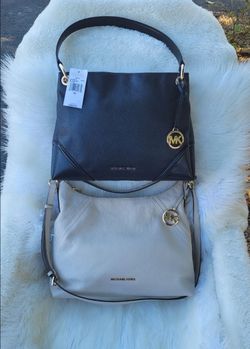 Mk Originales Nuevas $140, por las dos.