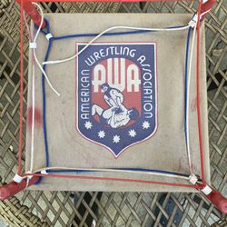 Vintage 1985 American Wrestling Association (AWA) wrestling ring (price $40) part of rope broken