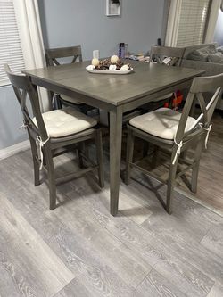 Beautiful gray table + 4 chairs! Like new.