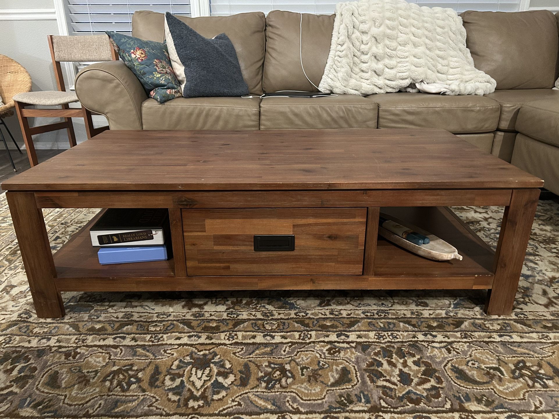 Brown Wood Coffee Table (27” X 53”)