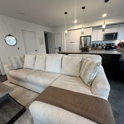 Chessington 2 Piece Sectional with Chaise - Ivory / Left Facing from Ashley’s furniture.