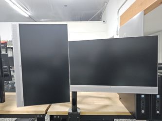 Dual HP LED 1080P WIDESCREEN MONITOR WITH POWER CORDS  ON A SINGLE STAND. 