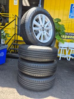 16"  TOYOTA WHEELS W/P205/65R16 GOODYEAR TIRES