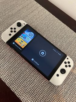 Nintendo Switch- OLED Model - Mario Red Edition w/ The Legend of Zelda Breath of the Wild