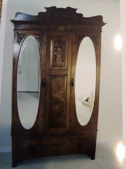 Vintage Antique hand carved armoire