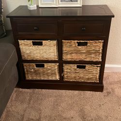 Storage unit with wicker baskets