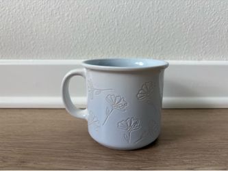 $5 for (1) Embossed Floral Ceramic Mug in Pale Blue