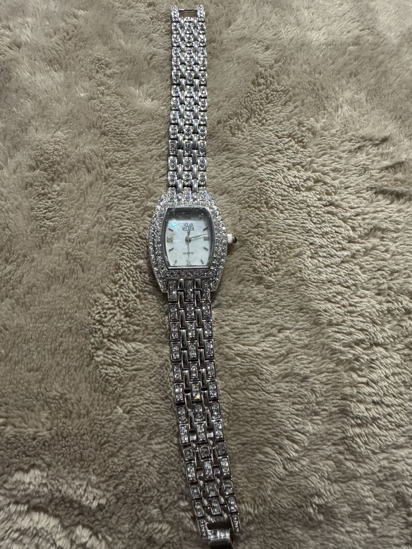 Nolan Miller Silvertone Watch