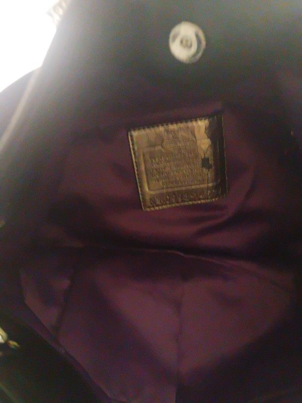 It's A Coach In A Small Wallet With It Too
