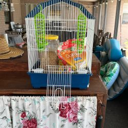 Small Birdcage And Food