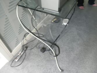 Glass top end table.. /tv stand.