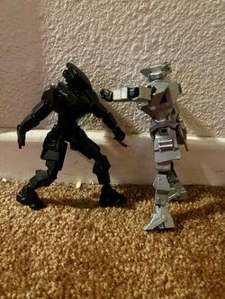 T13 silver and black action figure