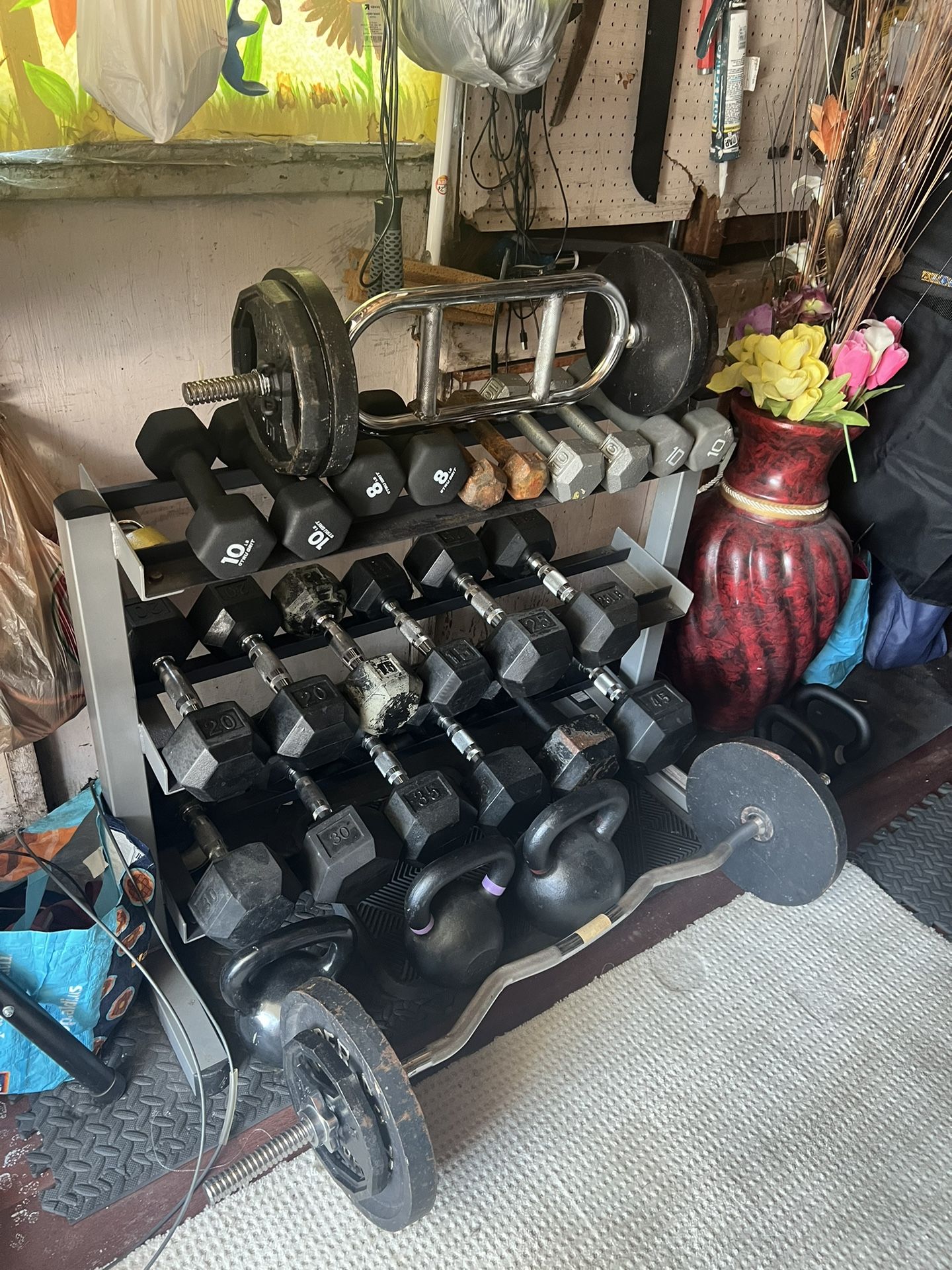 Rack & dumbbells Weight 5.10 .15.20.25.30 35 Only 1 ,50 Pounds &1. 45 Pons 8 Pons & 