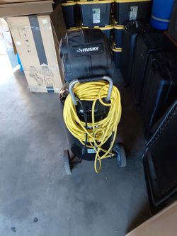 Husky portable air compressor with hose