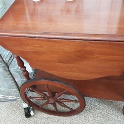 TEA CART ANTIQUE.  IT LOOKS LIKE 1925?  GOOD CONDITION.   MADE BY OW RICHARDSON  FURNITURE AND FLOOR COVERING CO.  CHICAGO. 