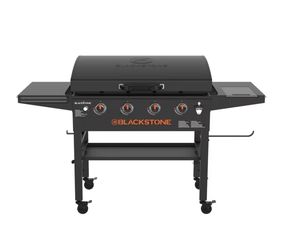 Blackstone 4-Burner Flat Top Griddle with built in hood, cutting board and more