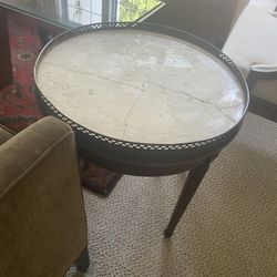 Vintage End tables one with the marble top one ornate one contemporary glass I have and table chairs other items to everything is priced separatelely