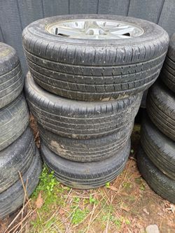 (4) 235 60 R17 tires on aluminum wheels