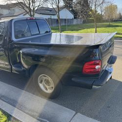 97-03 ford f-150 lightning bed cover with spoiler