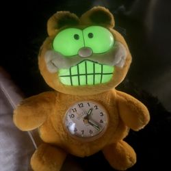 1978 Vintage Glow in the dark clock plushie- Garfield