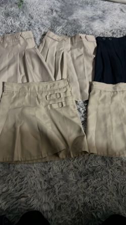 5 school skirts, size 10, worn a couple of times.