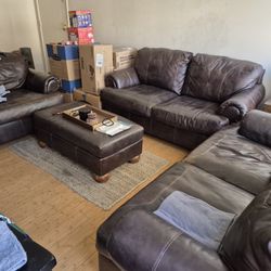 Leather Love Seats. Ottoman. Chair. $300