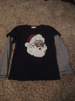 Child’s Christmas top.