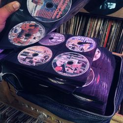 Large spanish CD Collection in Zippered Cases