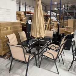 Brand new 8 pieces outdoor patio set with 6 chairs and one glass table and one umbrella 