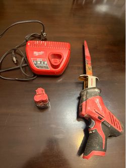 Milwaukee hacksaw battery & charger