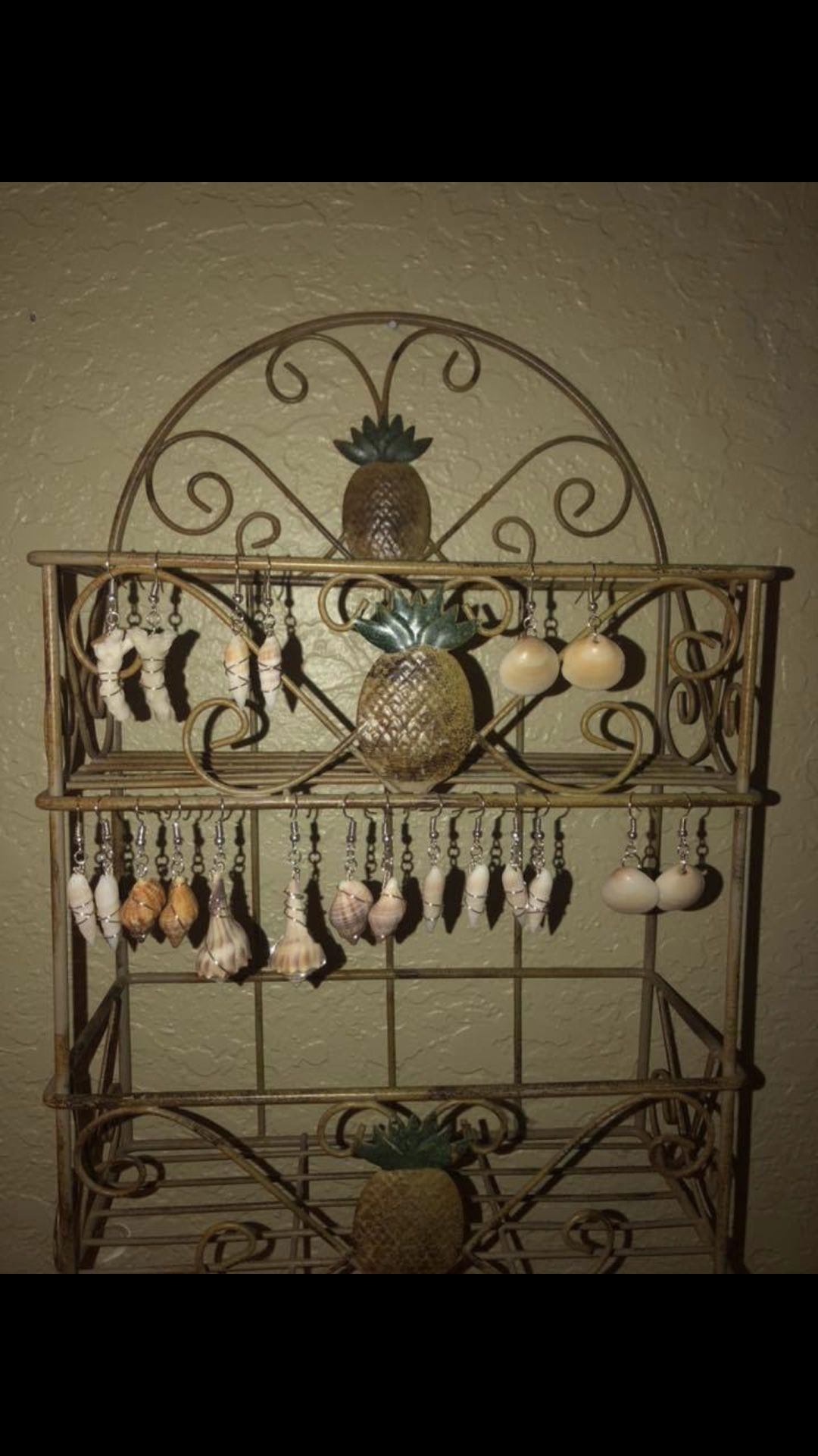 Handcrafted genuine shell, coral and shark teeth earrings, hair clips, necklaces and bracelets.