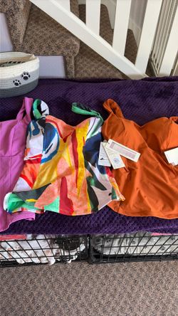 these are threeCalia swim tops