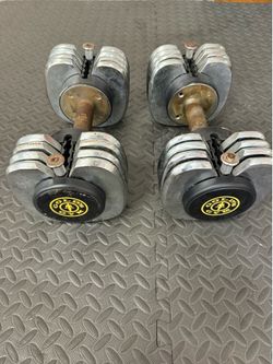 50 lbs (each) Golden Gym Adjustable Dumbbell (one is broken)