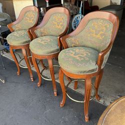 Set of 3 Wooden Swivel Bar Stools with a Green and Gold Dragon Print Upholstery Good Condition 