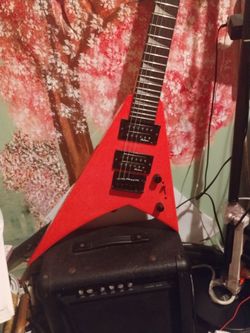 Jackson Randy Rhoades mini hot pink electric guitar king v series
