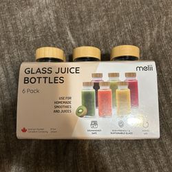 Glass juice bottles. 6 pack 