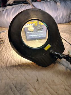 Two vintage lamps one with magnifier