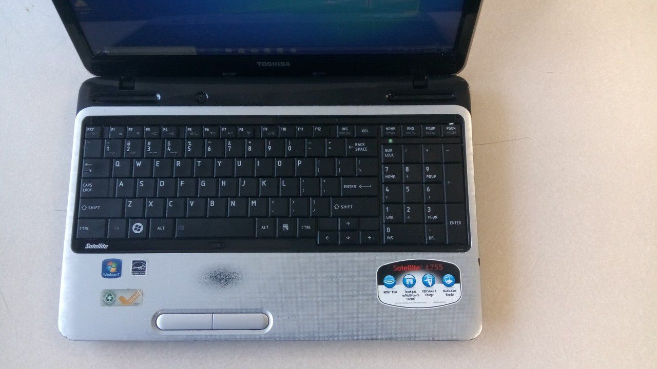 Gray Toshiba Laptop Quad